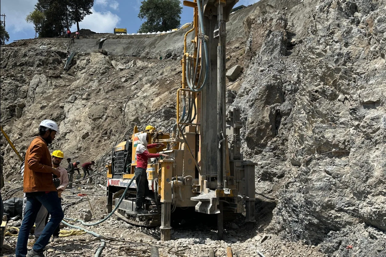 Bharat Infraprojects drilling rig operating on a Himalayan slope
